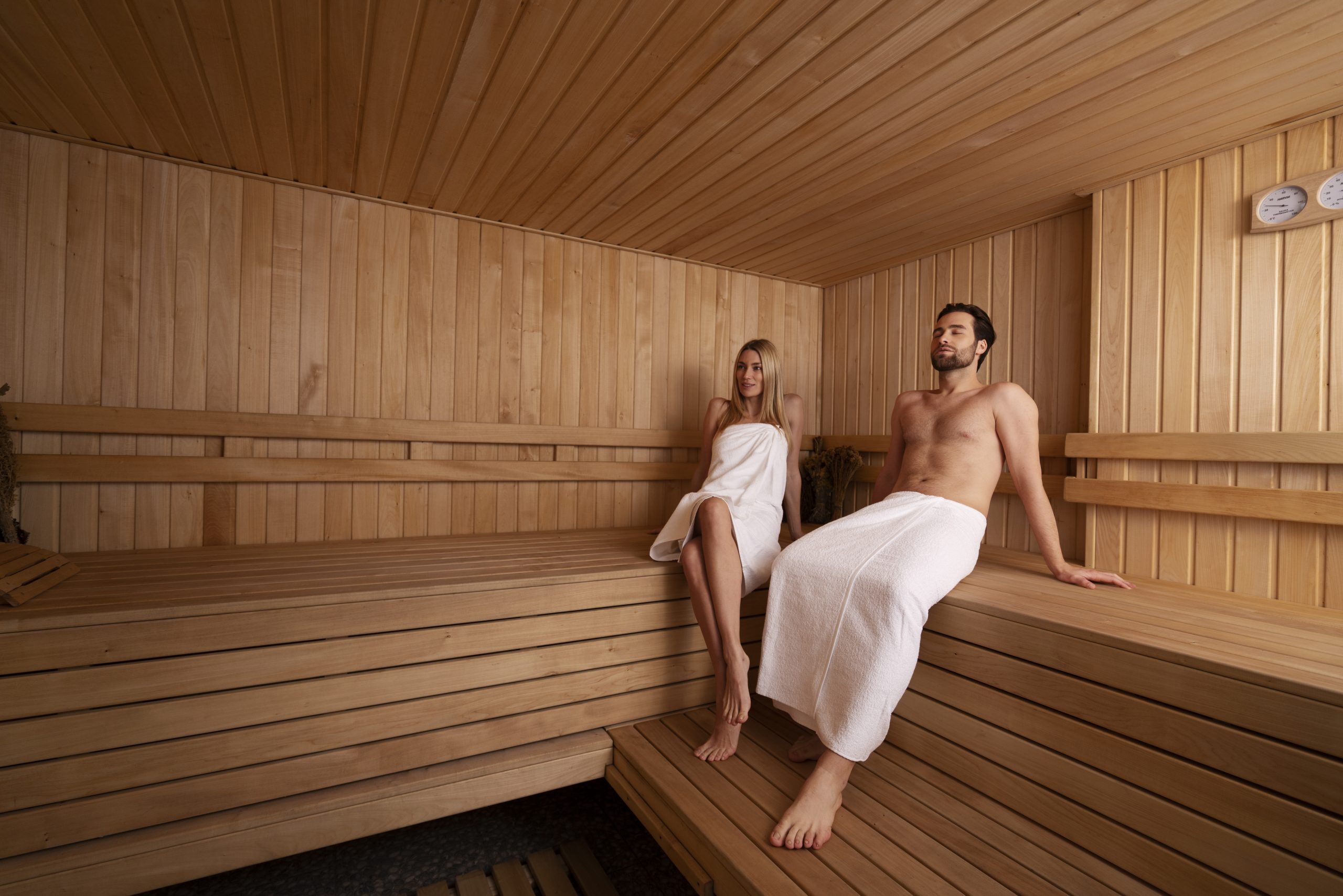 close-up-couple-relaxing-sauna